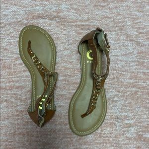 Brown guess flip flops with backs